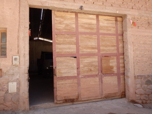 Pasacana Cactus Wood panels in the garage door.